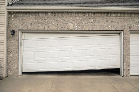 3 Common Causes of Misaligned Garage Door Tracks post image alt text